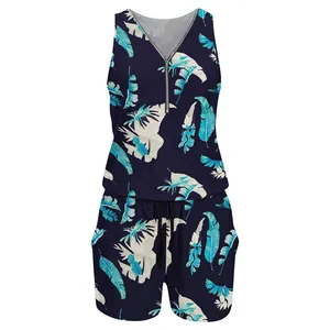 Detailed view of women's sleeveless romper with tropical leaf print and front zipper