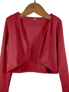 Detailed macro view of a burgundy short shrug bolero cardigan on a wooden hanger