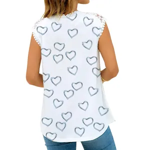 Back view detail of women's white sleeveless top featuring blue heart print and lace trim