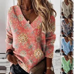 Detailed view of women's V-neck printed sweatshirts in various patterns and colors