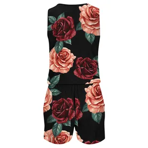 Back view of black sleeveless romper with vibrant red and pink rose floral print