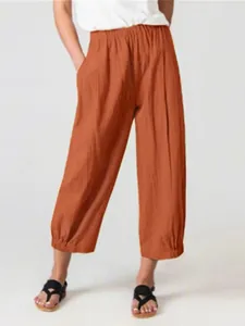 Comfortable women's rust orange loose-fit wide-leg cropped pants with elastic waist