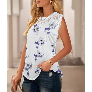 Detail of white sleeveless top with blue butterfly prints and delicate lace neckline.