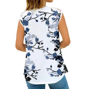 Back view of a white sleeveless women's top with blue floral print and lace