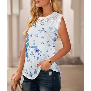 Close-up detail of a white sleeveless floral tank top with lace trim and dragonfly print.