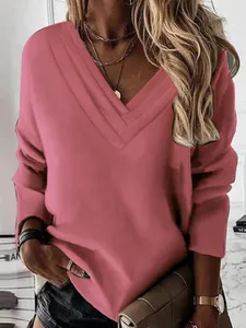 Elegante sudadera rosa de manga larga para mujer con un original escote en V
