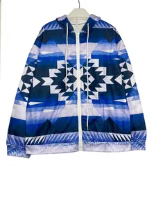 Detailed front view of women's blue geometric print zip-up hooded sweatshirt with drawstring