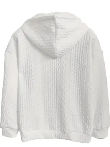 Detailed back view of a white cable knit hoodie with intricate textured patterns.