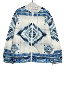 Vintage women's zip-up hoodie featuring a stylish blue and white Aztec tribal print