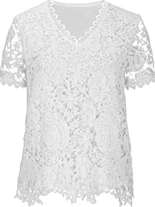 Detailed close-up of elegant white floral lace top with intricate rose patterns