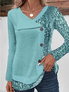 Detailed view of women's ribbed V-neck top featuring printed sleeve and button accents