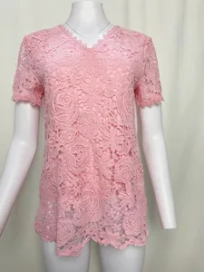 Elegant pink lace short sleeve top featuring floral rose patterns and a V-neckline detail