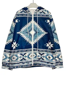 Detailed view of women's long sleeve zip-up hoodie with blue ethnic geometric print.