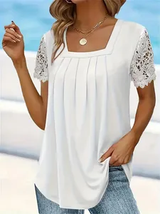 Detail of elegant white square neck top with intricate lace sleeves and pleated chest design
