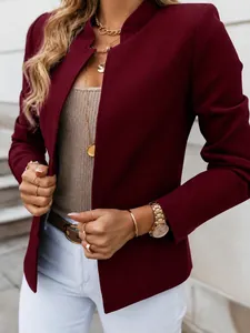 Detail view of a wine red long sleeve blazer with a stylish mandarin collar for women