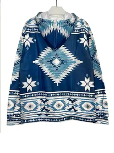 Detailed back view of a women's hoodie featuring a striking blue Aztec geometric pattern