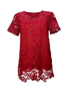 Detailed view showing the intricate floral lace texture of this red V-neck short sleeve top