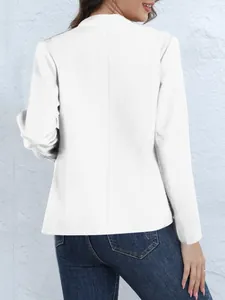 Detailed back view of a sleek white long-sleeved blazer with a minimalist stand collar.