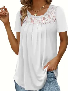Detailed view of white short sleeve top with elegant pink lace neckline embroidery