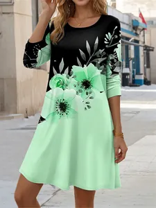 Vue détaillée d'une robe tendance à manches longues avec imprimé floral menthe