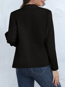 Detailed back view of a stylish black long-sleeve blazer with a modern stand collar