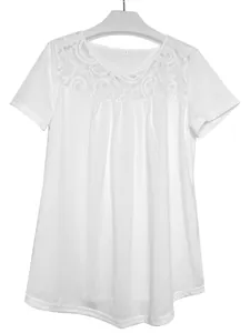 Detail of a white short-sleeve T-shirt featuring an elegant lace neckline and pleats.
