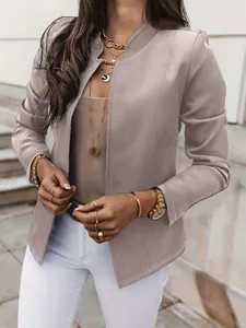 Detail view of a stylish mauve solid color long sleeve blazer with a stand collar