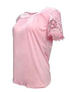 Detailed side view of a pink casual round neck top with delicate lace short sleeves.