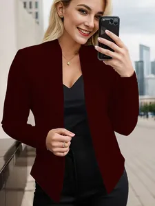 Elegant burgundy shawl collar blazer jacket for women shown in urban lifestyle setting