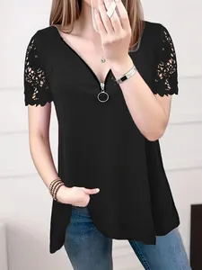 Women's black V-neck lace short sleeve top with zipper front and ring detail
