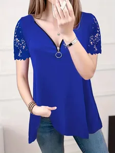 Women's V-neck royal blue short sleeve top with lace sleeves and front zipper detail