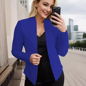 Stylish royal blue open front blazer for women in a chic urban mirror selfie pose