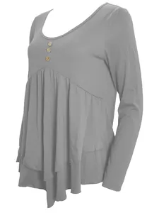 Detail view of stylish gray long-sleeved tunic with three decorative wooden buttons