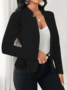 Close-up detail showing elegant lace patchwork on a slim-fit long sleeve women's blazer