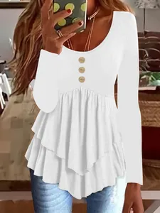 Elegant white long sleeve tunic with decorative buttons and tiered ruffled hem for women