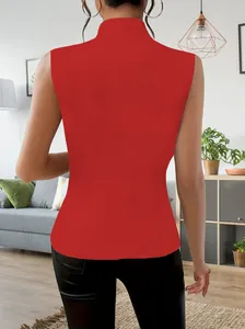 Elegant red sleeveless blazer vest for women, back view detail in a modern home interior