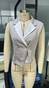Close-up detail of slim fit sleeveless blazer vest with contrast white lapel collar