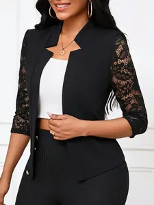 Detailed view of women's black slim-fit blazer featuring elegant lace three-quarter sleeves