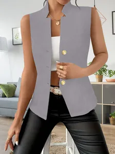 Close-up of elegant gray sleeveless blazer vest with three golden buttons