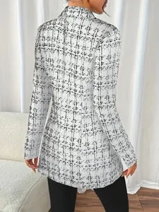 Back view of women's slim-fit white and black tweed patterned blazer with lapels