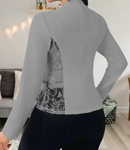 Rear view of grey slim cardigan featuring elegant lace patchwork on side and back