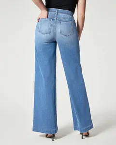 Back view of women's wide-leg washed denim jeans with high-stretch mid-waist fit