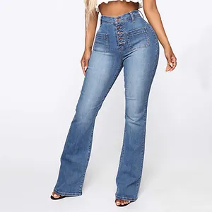 Detailed view of high-waisted washed denim flare jeans with button fly and patch pockets.
