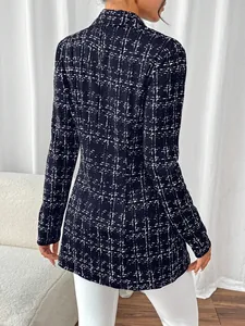 Detailed back view of a slim fit women's blazer featuring a black and white tweed pattern