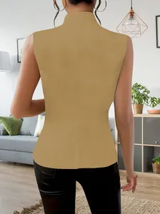 Back view of an elegant tan sleeveless vest for women presented in a modern living room setting