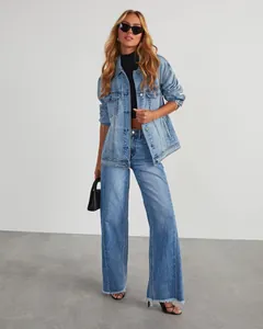 Full-length view of women's loose wide-leg denim jeans with trendy frayed hem design