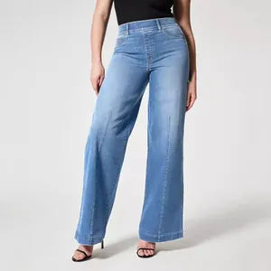 Stylish women's wide-leg mid-waist washed denim jeans featuring a comfort elastic waistband
