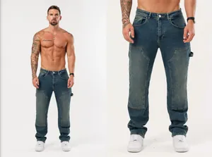 Stylish men's loose blue denim jeans with unique knee panel details and straight leg fit