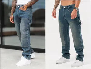 Men's loose-fit blue denim jeans with stylish patchwork design in streetwear style.