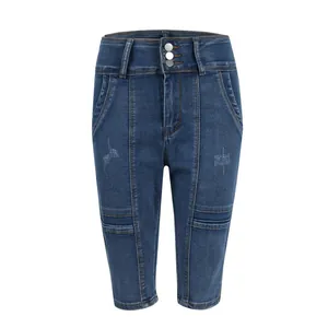 Detailed view of women's blue denim capris with high waist and triple button closure